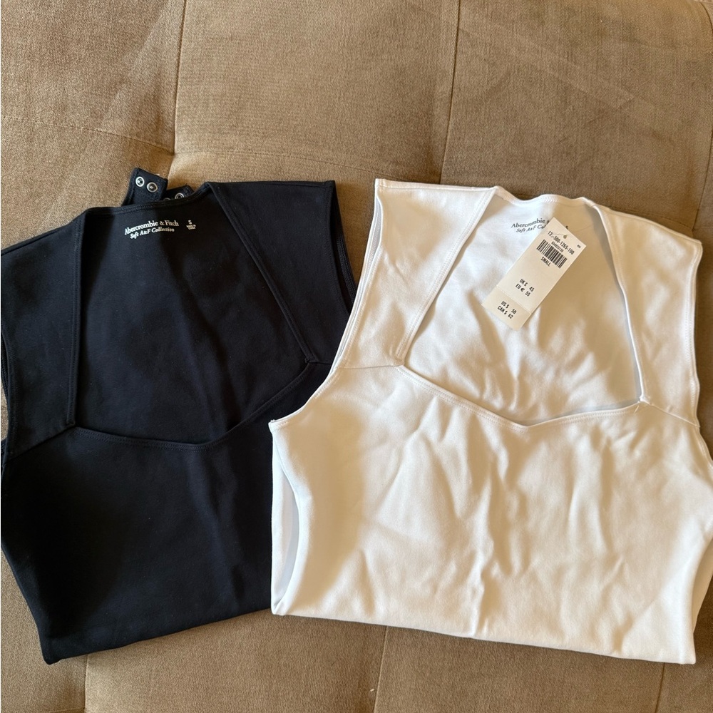 Abercrombie & Fitch - White and black thong bodysuit size small. Neither worn.